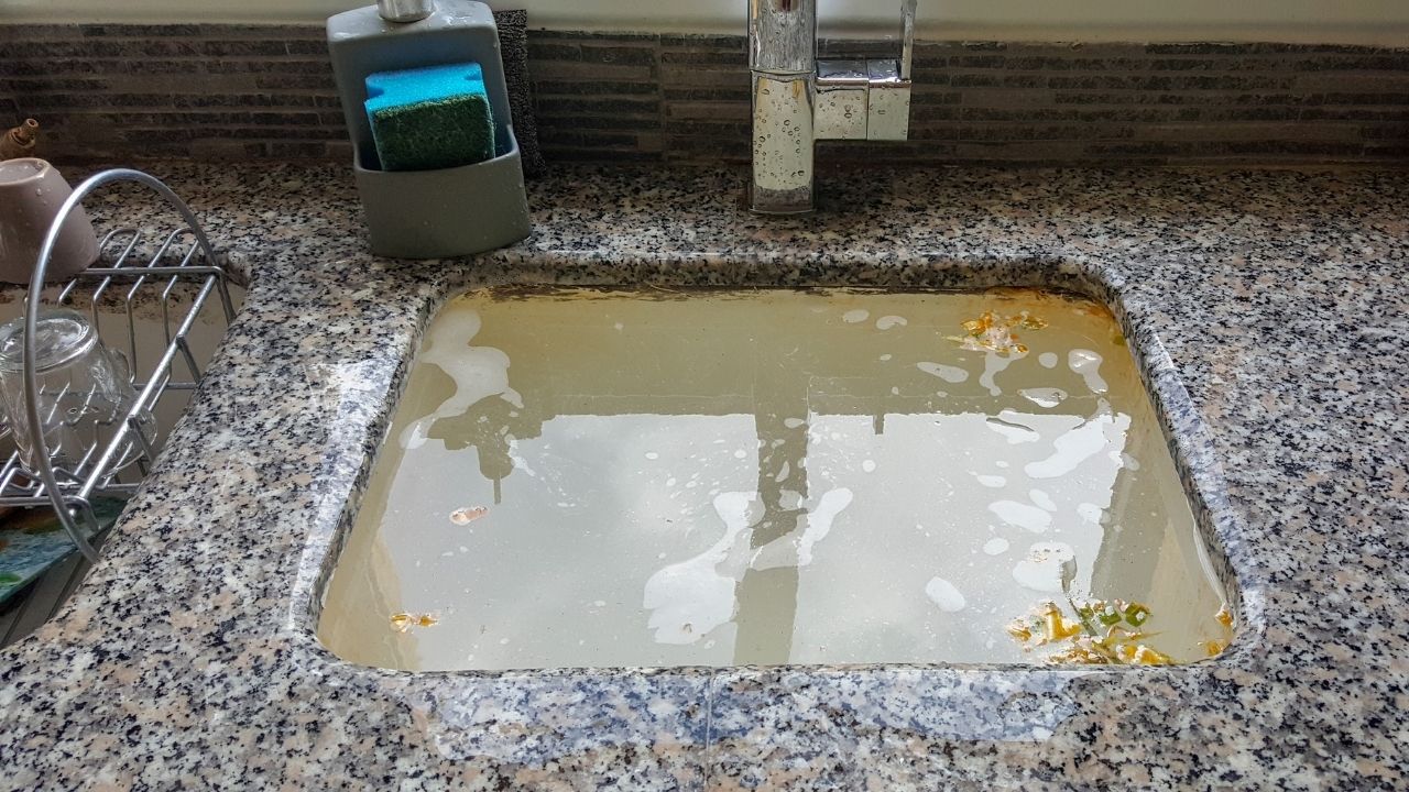 featured image of 6 easy ways to unclog a kitchen sink from Dad Answers All