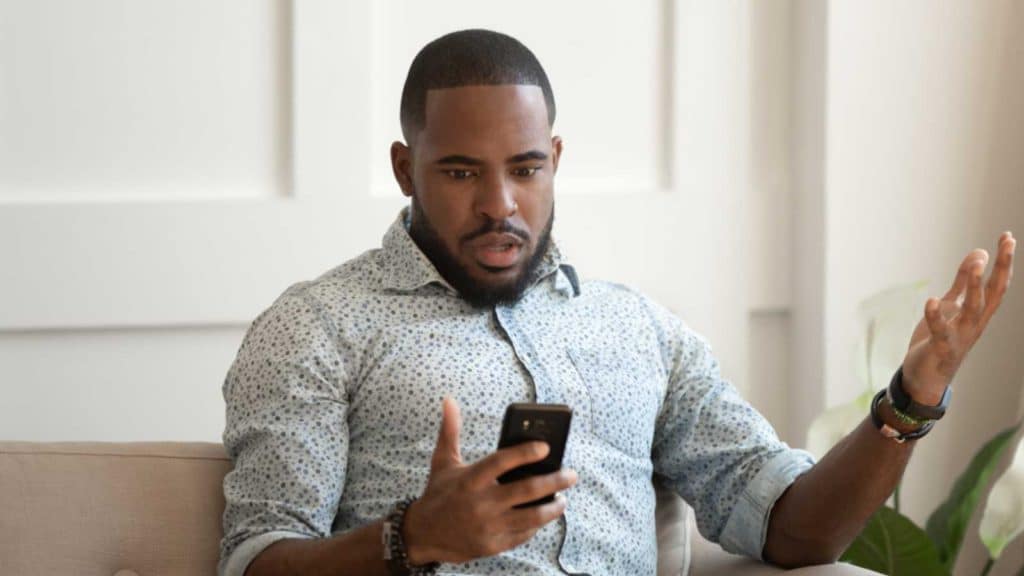 Man Getting Shocked Watching Mobile Shutterstock Msn