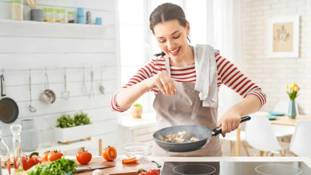 Woman Cooking In Kitchen Shutterstock Msn
