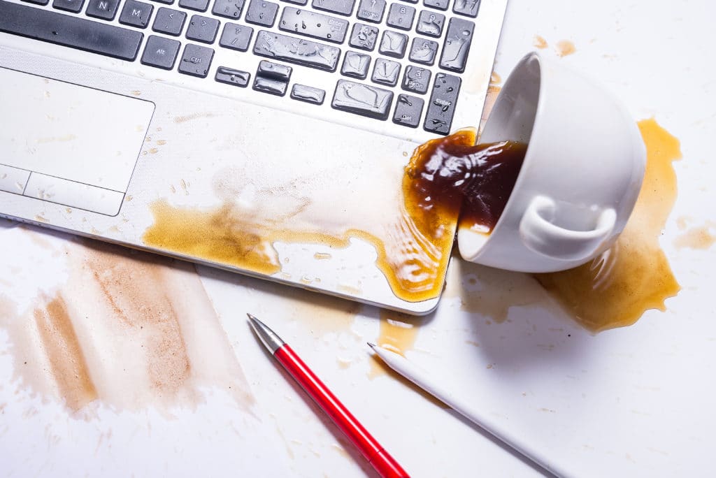 Spill,coffee,on,a,computer,keyboard