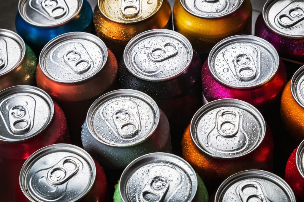 Aluminum,cans,of,soda,background.,the,view,from,the,top