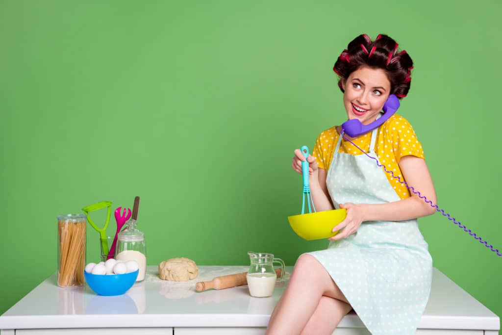 Photo,of,attractive,young,lady,cooking,cheerful,sitting,table,kitchen