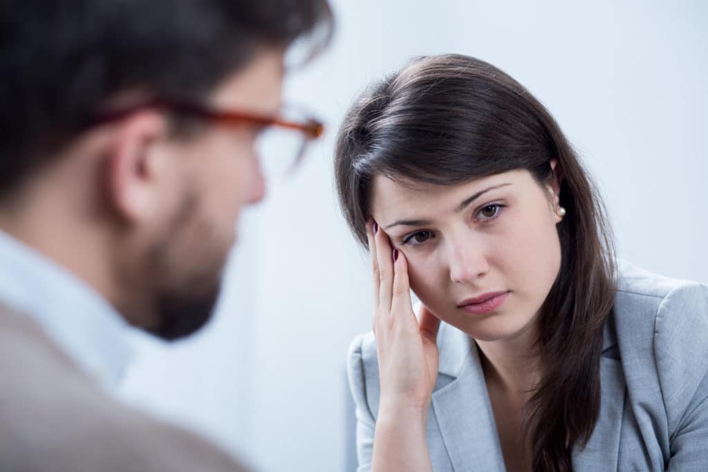 Image,of,depressed,woman,on,session,with,psychologist
