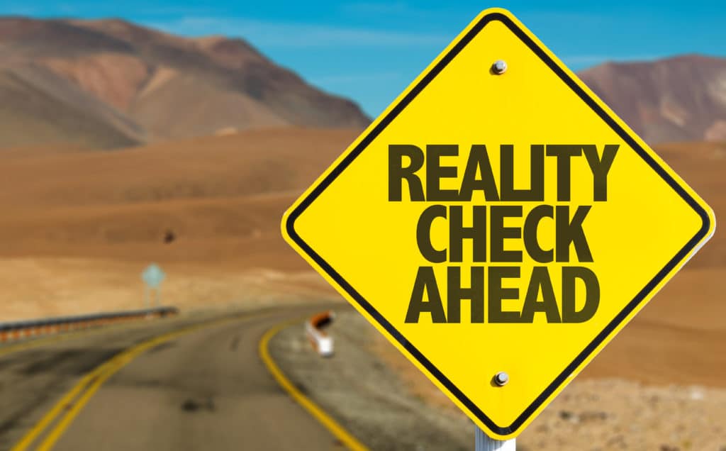 Reality,check,ahead,sign,on,desert,road