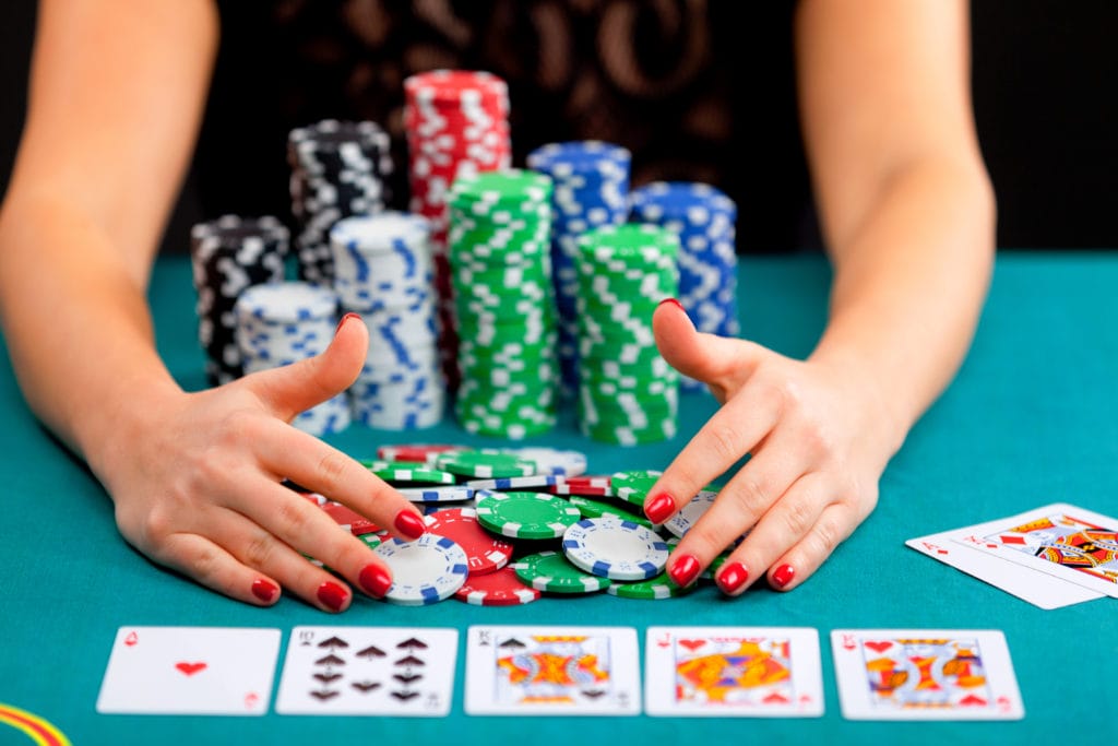 Young woman with gambling chips