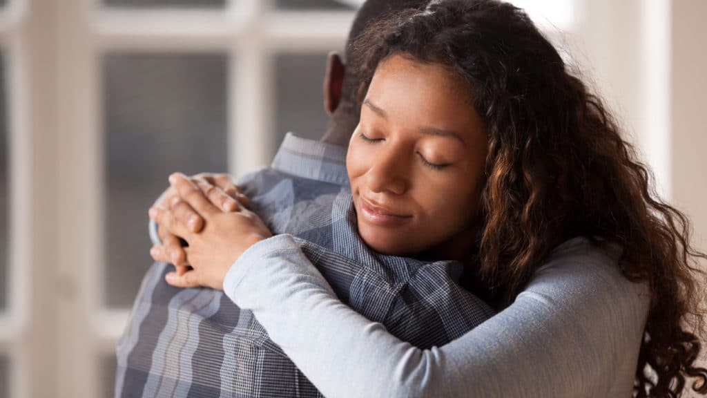 Happy Mixed Race Woman Hug Black Man Husband Glad To