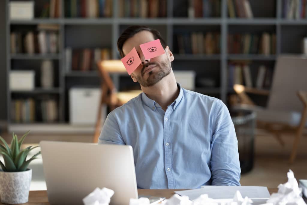 Exhausted Tired Businessman With Painted Eyes On Stickers Adhesive Notes