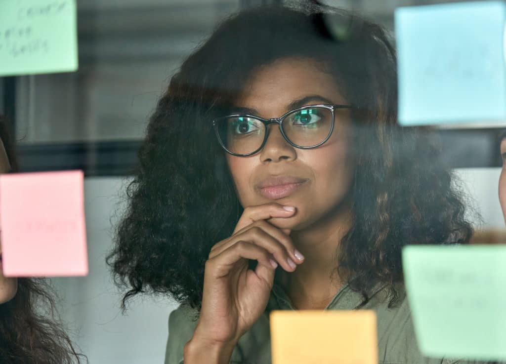 Young Thoughtful African American Girl Student Employee Leader At Modern