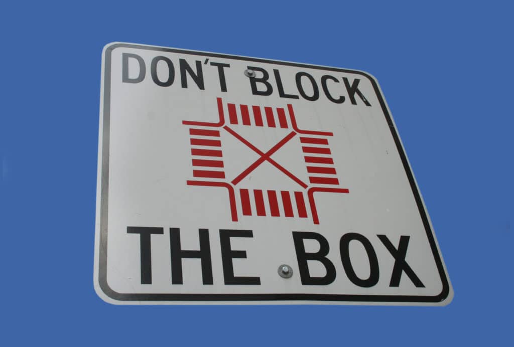 Don't Block The Box At An Intersection Road Sign