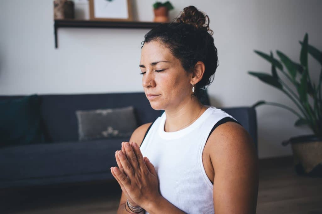 Mindfulned Female Yogi Getting Calm Inspiration During Spiritual Meditation In