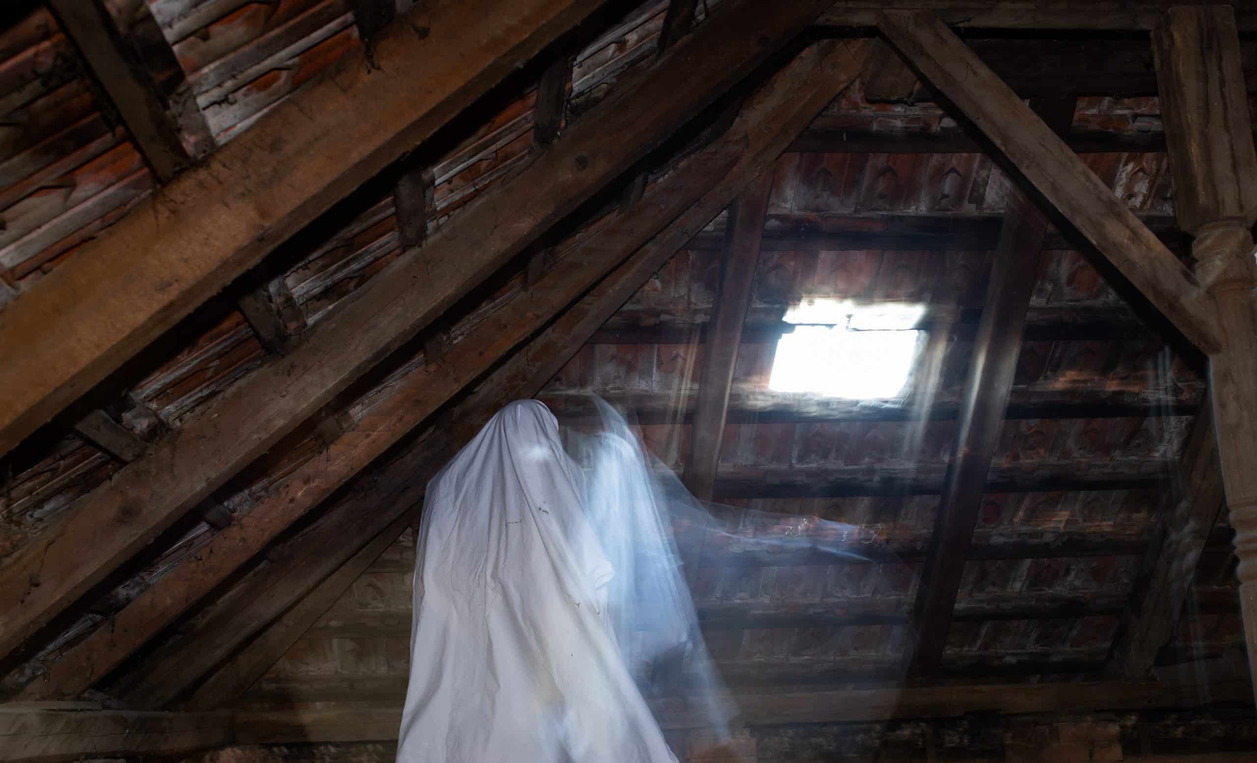 Blurred Image Of Ghost In The Attic Haunted House For