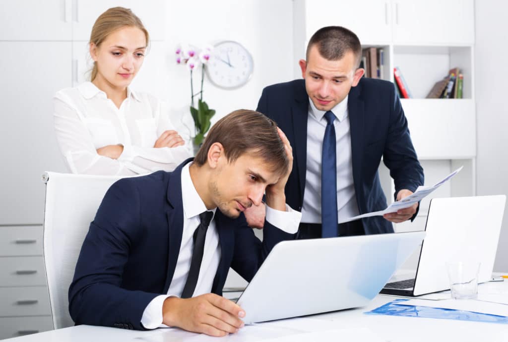 Three Annoyed Coworkers Different Sexes Experiencing Business Failure In Firm