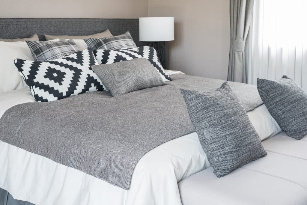 Bed And Pillows In Modern Bedroom Black And White Color