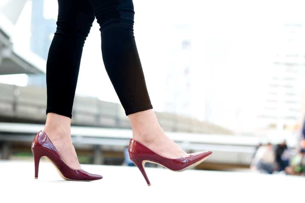 Leg Of Woman Beauty Put On Red High Heels Walk