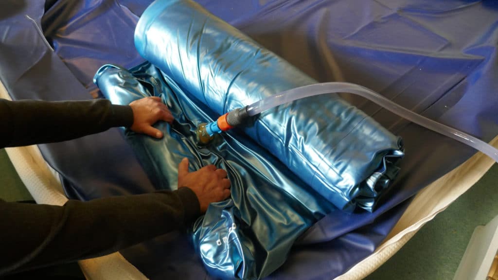 Emptying And Dismantling A Pvc Waterbed Mattress.
