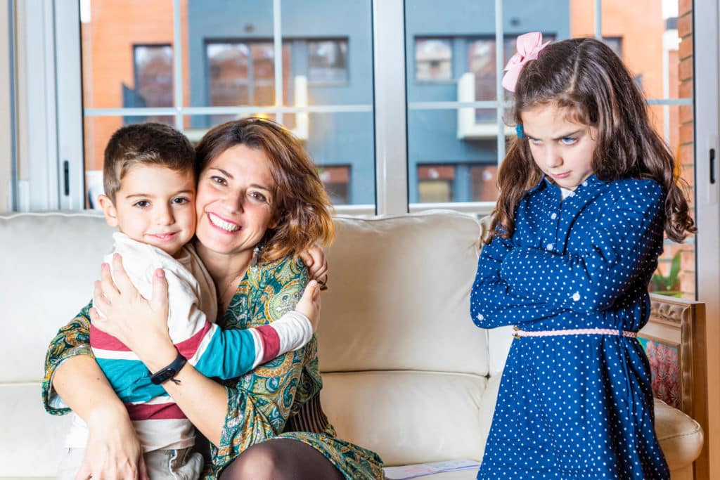 Jealous Girl To See Her Brother Hug Her Mother