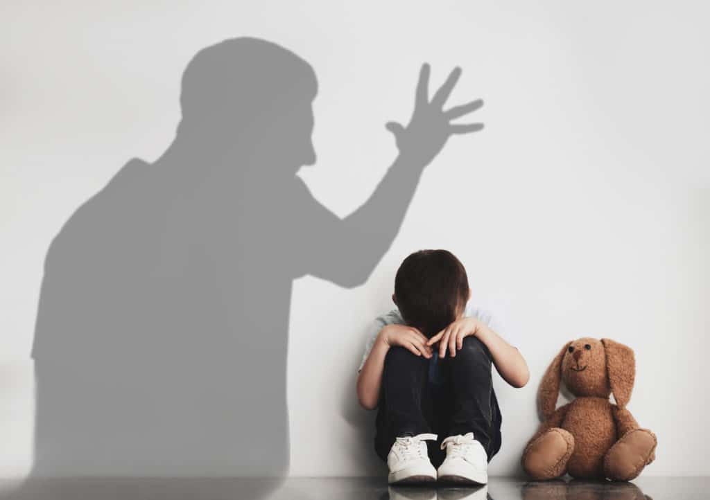 Child Abuse. Father Yelling At His Son. Shadow Of Man
