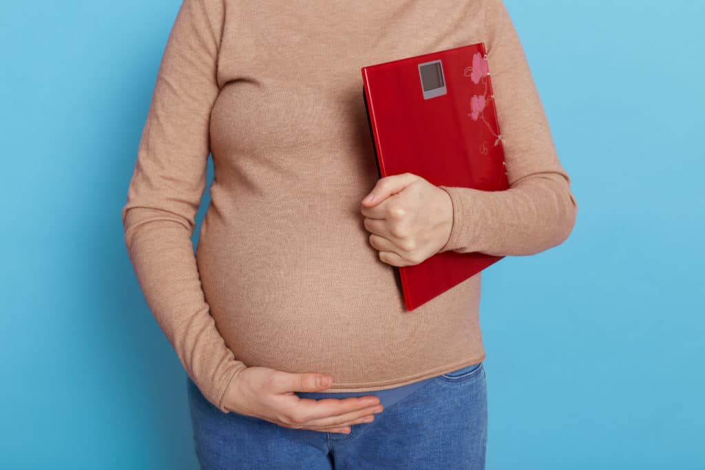Weight Gain During Pregnancy Pregnant Woman Holding Scale Faceless Future