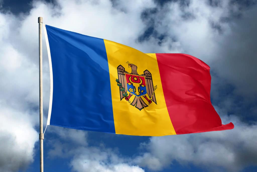 Moldova Flag On Sky And Cloud Background. National Symbols Of