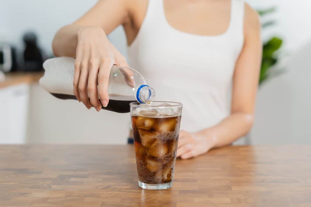 Thirsty Asian Young Woman Girl Holding Pouring Cold Cola Soft
