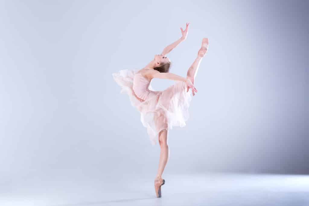Young And Incredibly Beautiful Ballerina Is Posing And Dancing In