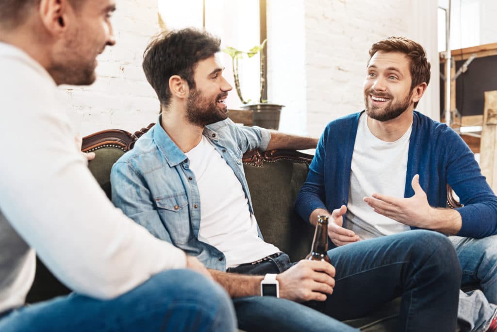 Nice Joyful Men Chatting With Each Other