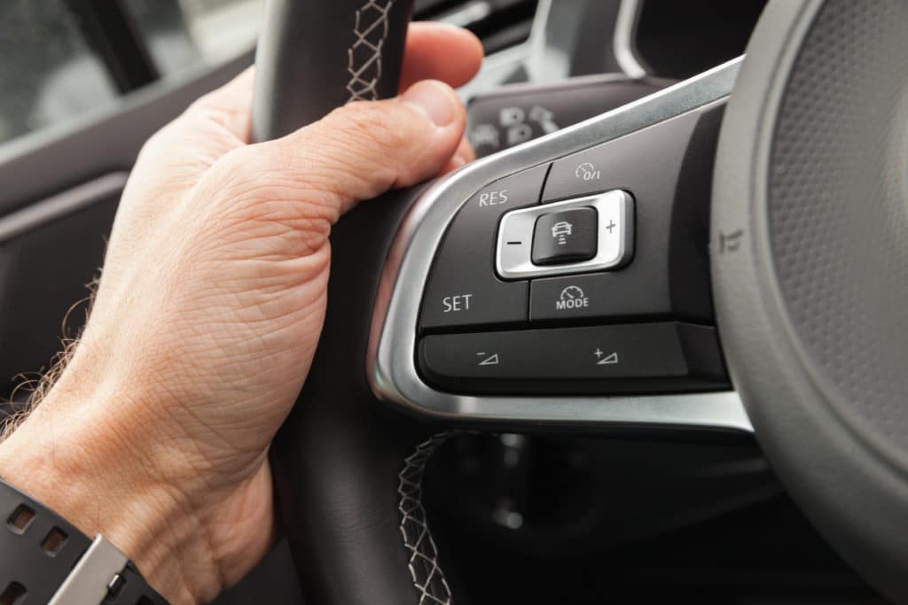 Adaptive Cruise Control Panel Buttons On Modern Car Steering Wheel 