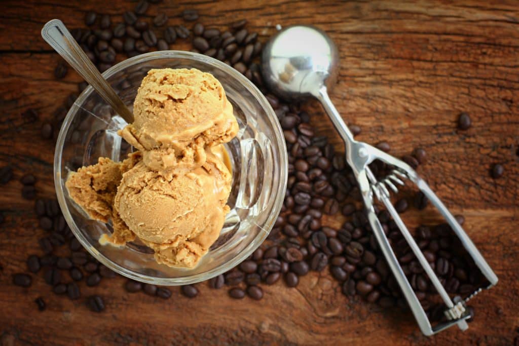 Coffee Ice Cream Decorated With Coffee Beans On Rustic Wooden