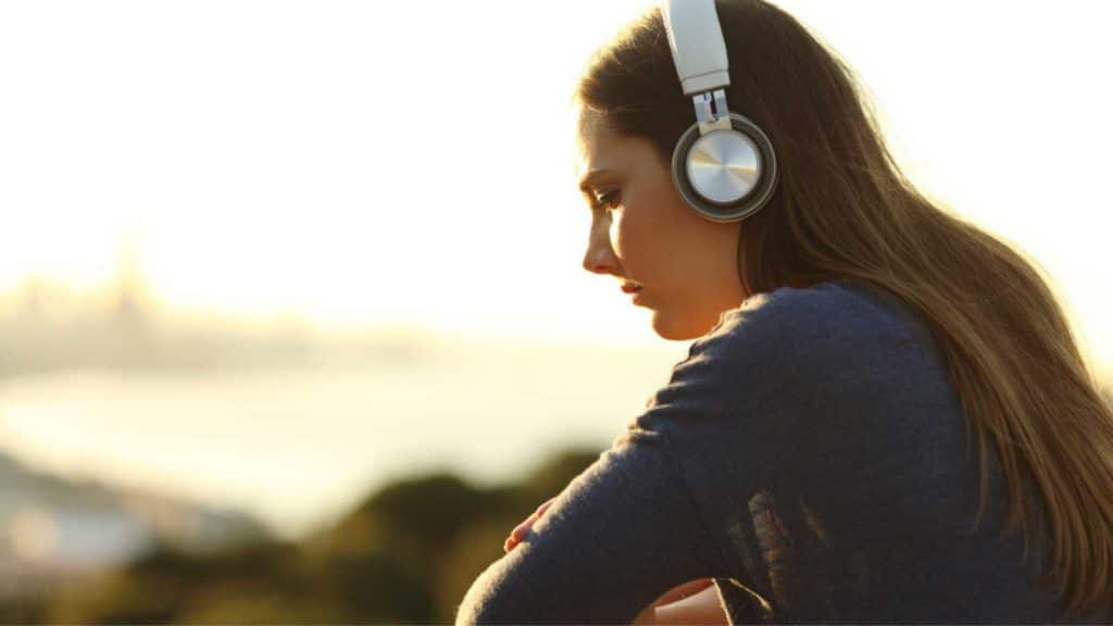 Woman Listening To Podcast