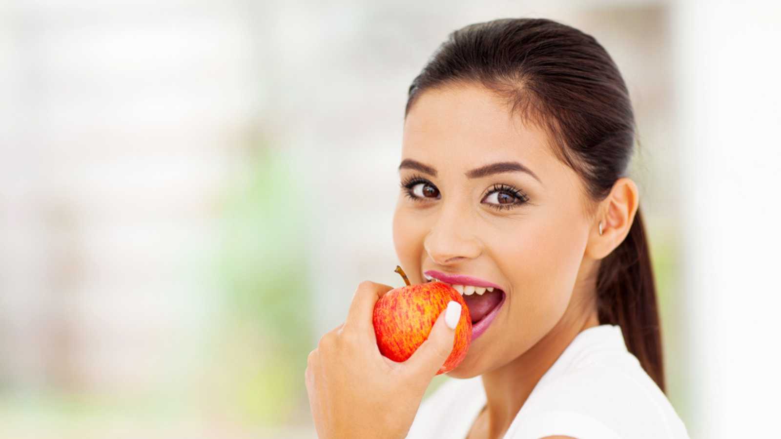 Woman Eating Apple 