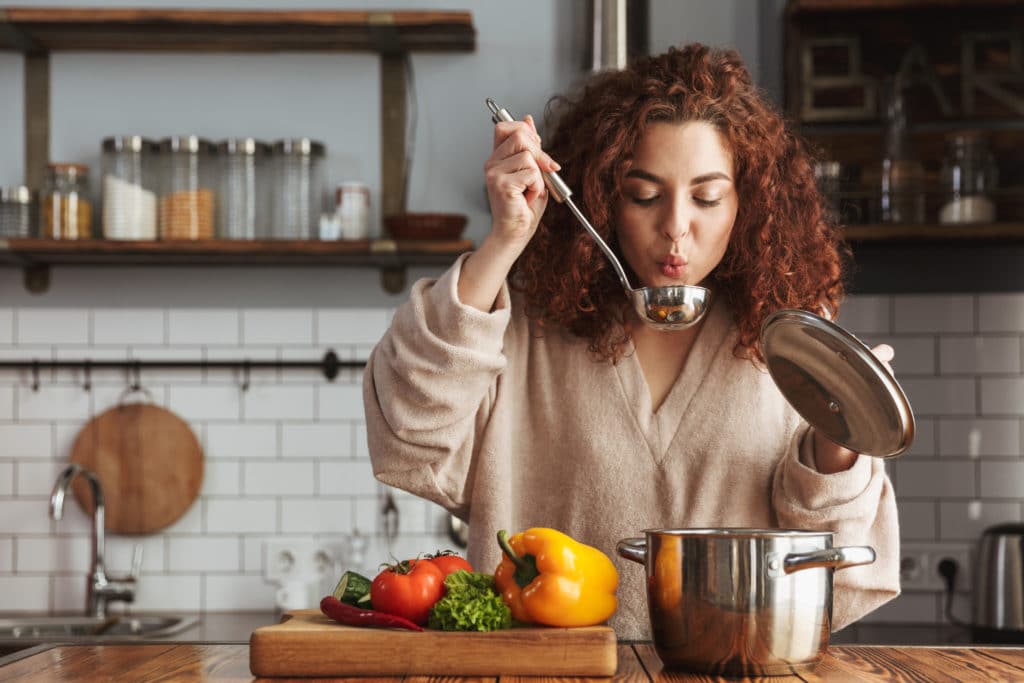 Photo Of Pretty Caucasian Woman Holding Cooking Ladle Spoon While