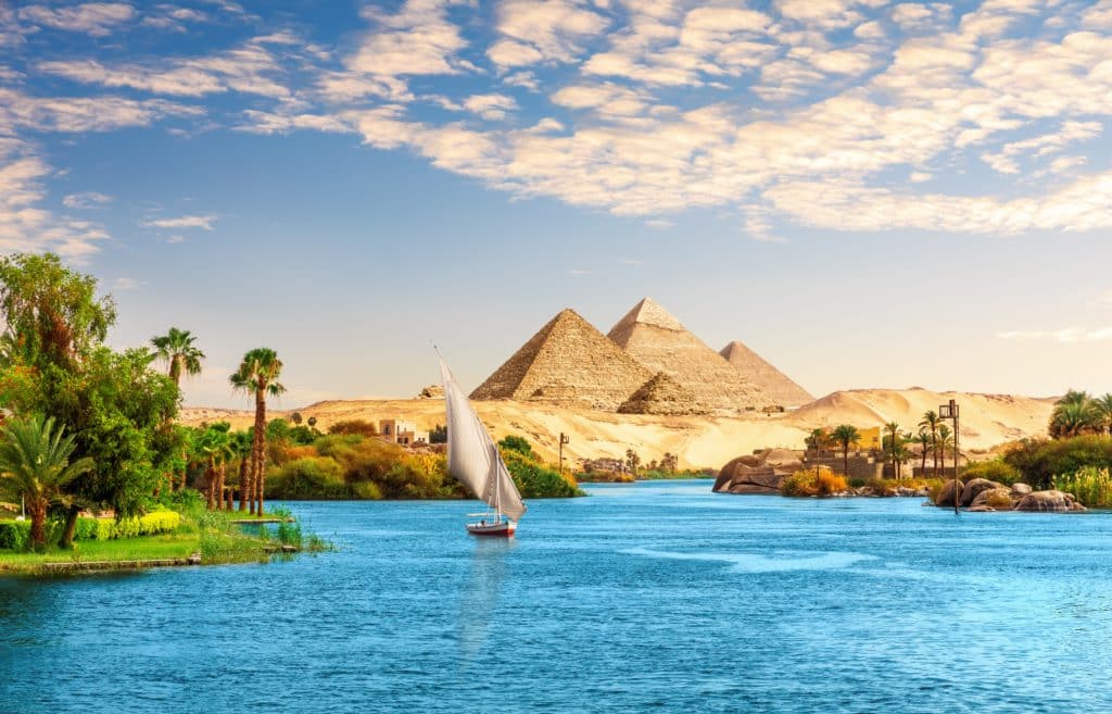 Beautiful Nile Scenery With Sailboat In The Nile On The