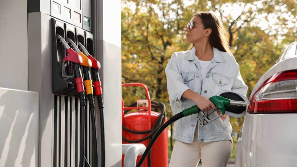 Woman Puting Gas