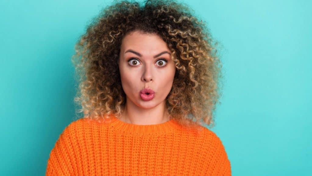 Woman With Curly Hair Amazed