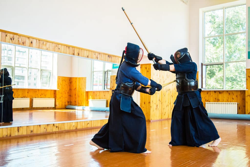 Close Up Of Kendo Fighter With Shinai. Japanese Martial Art