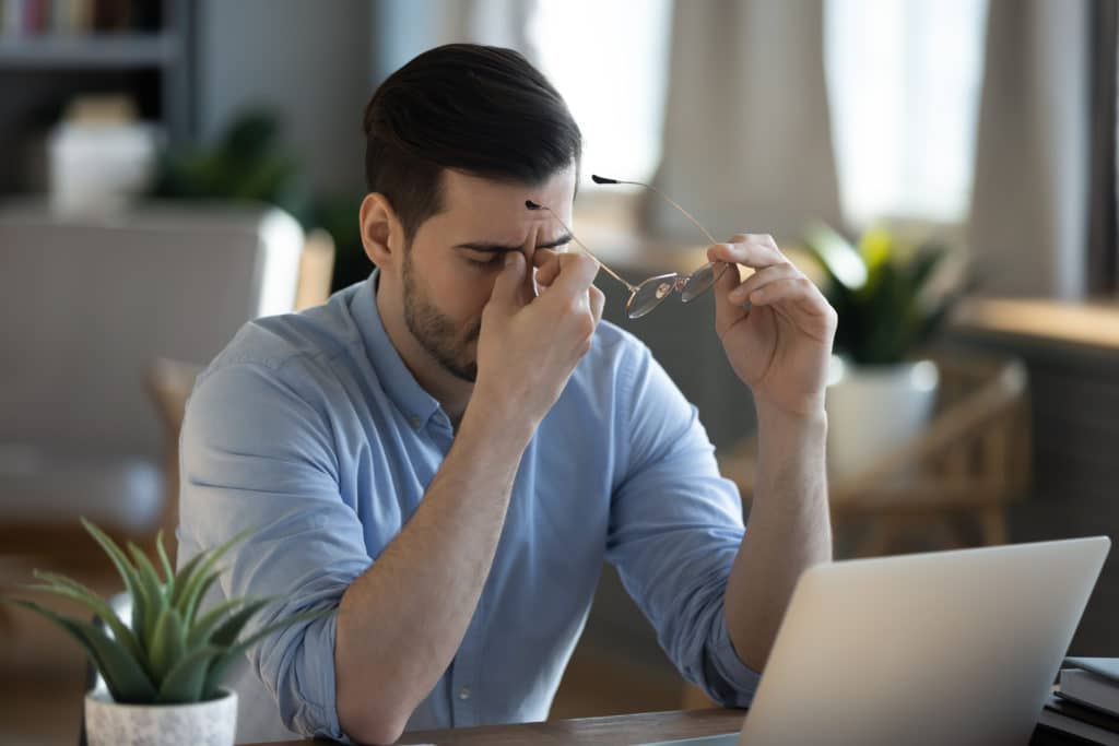 Tired Exhausted Businessman Massaging Nose Bridge Taking Off Glasses Feeling