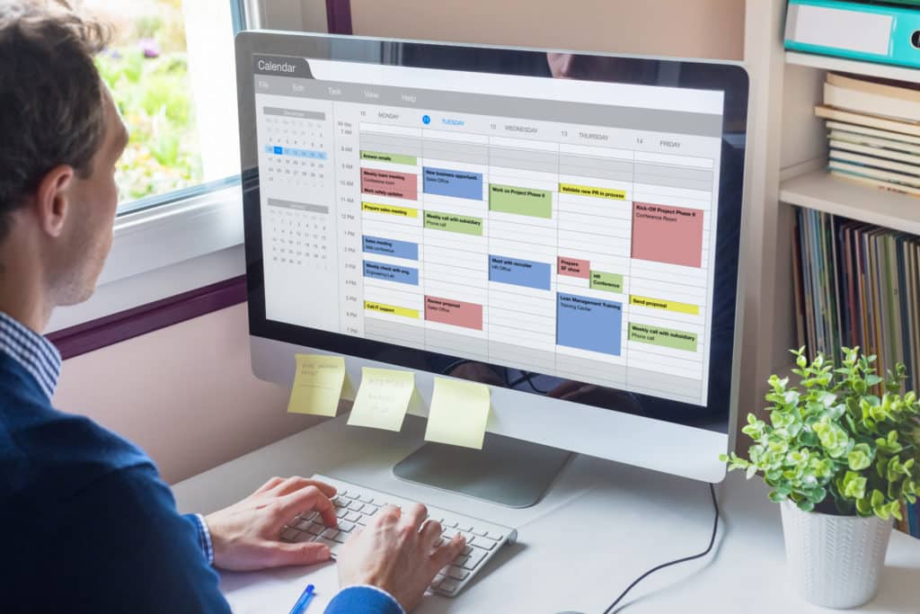 Calendar Software Showing Busy Schedule Of Manager With Many Meetings 