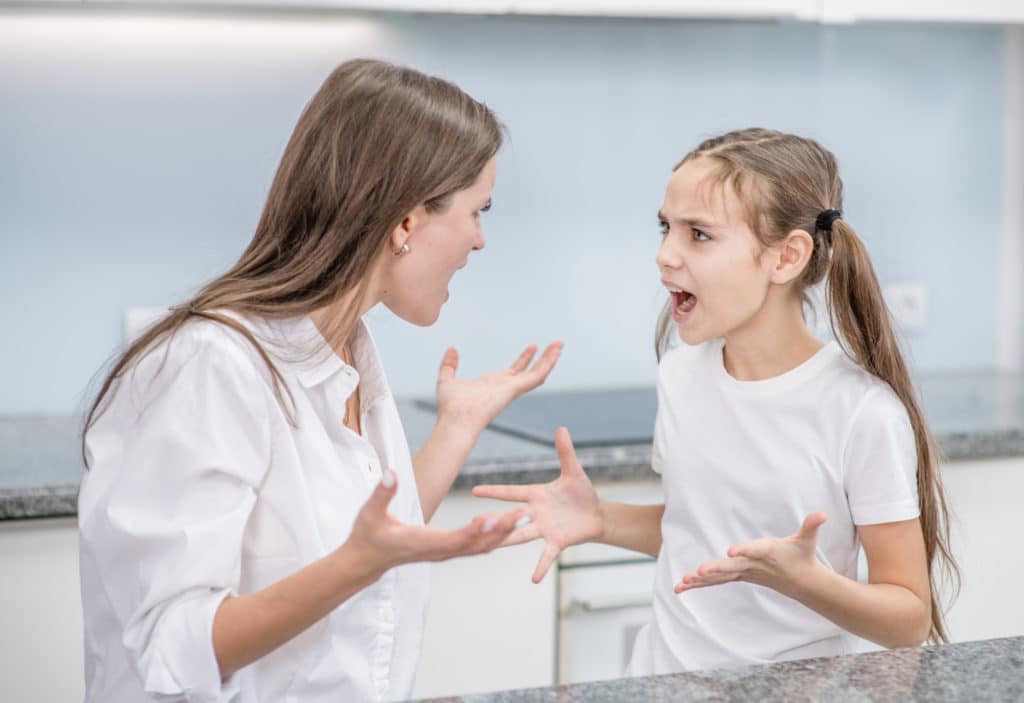 Mom And Daughter Shout At Each Other At Home