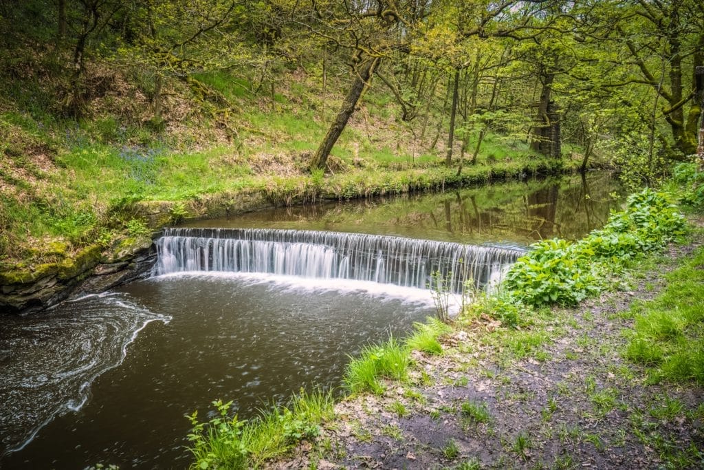 Weir On Bradshaw Brook At Jumbles Country Park Above Bolton