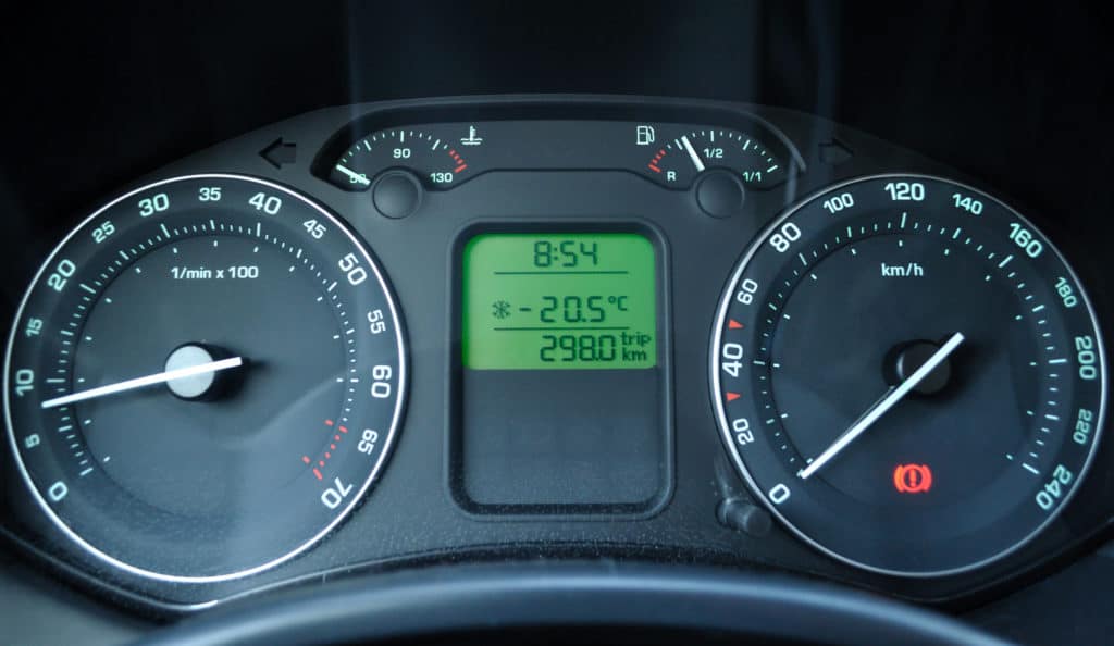 Dashboard Of A Car In Winter Freezy Times. The Thermometer