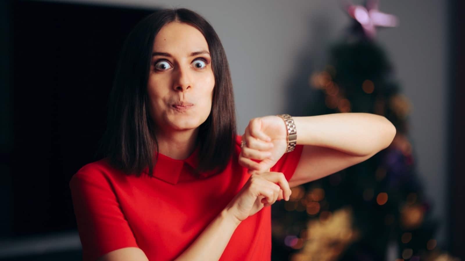 Woman Seeing Watch And Telling It's Late