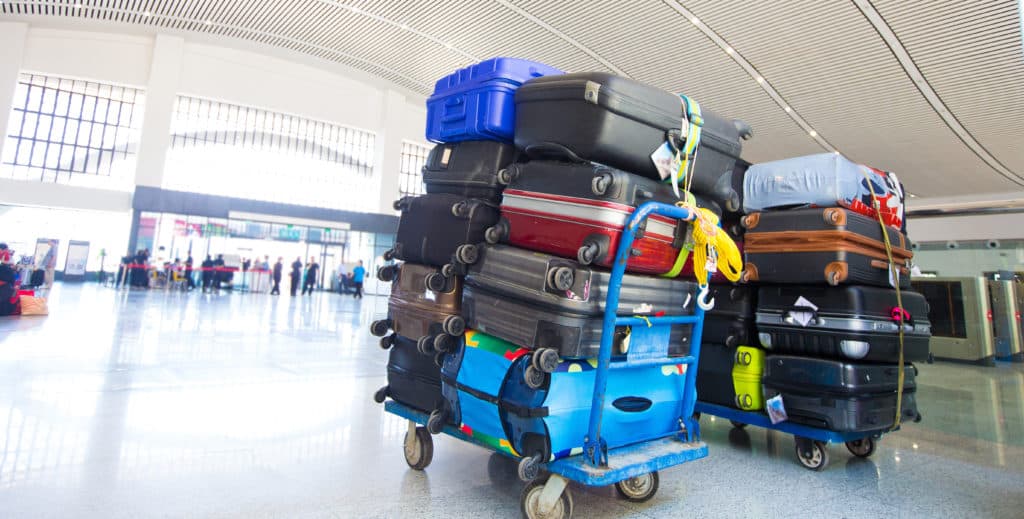 Many Colorful Luggage Stack Over Bags Before Loading Carrying To