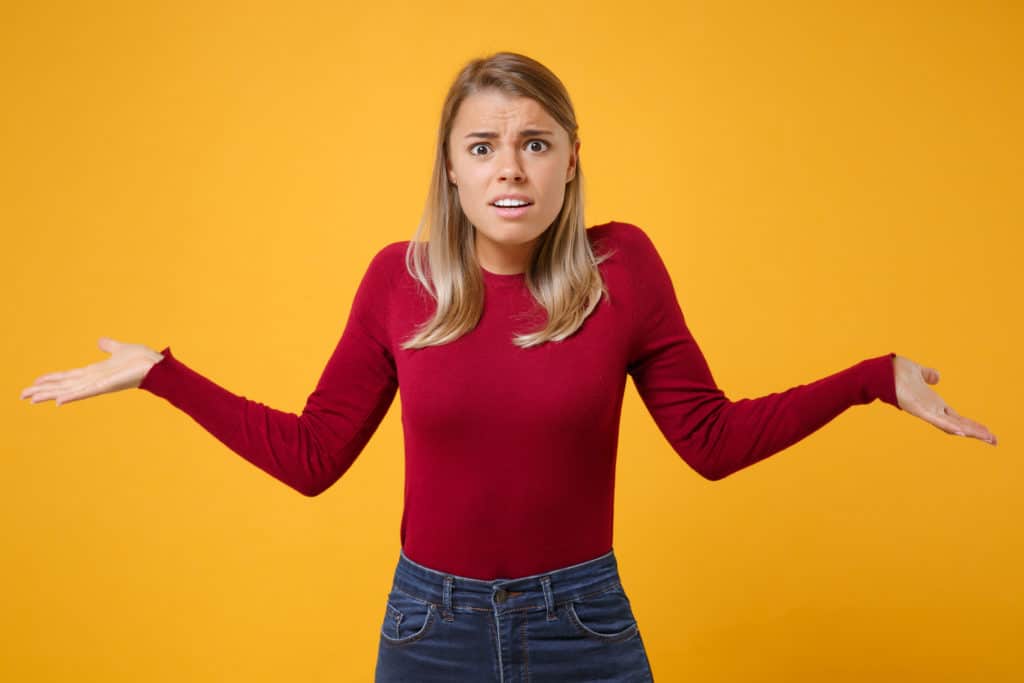 Shocked Perplexed Young Blonde Woman Girl In Casual Clothes Posing