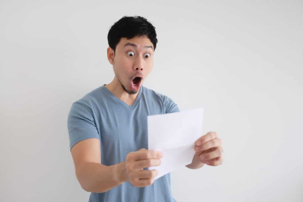 Asian Man Surprise And Shocked By The Letter In His