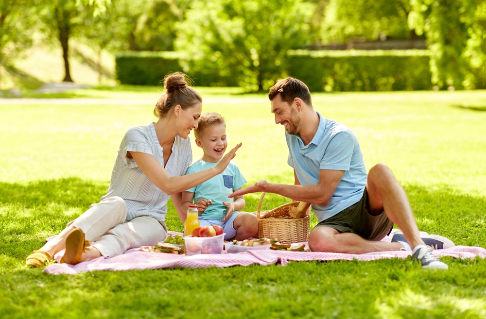 Family Leisure And People Concept Happy Mother Father And